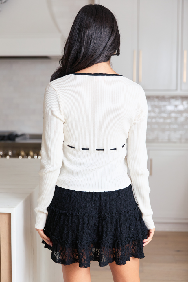 Emeline White With Black Trim Long Sleeve Babydoll Top