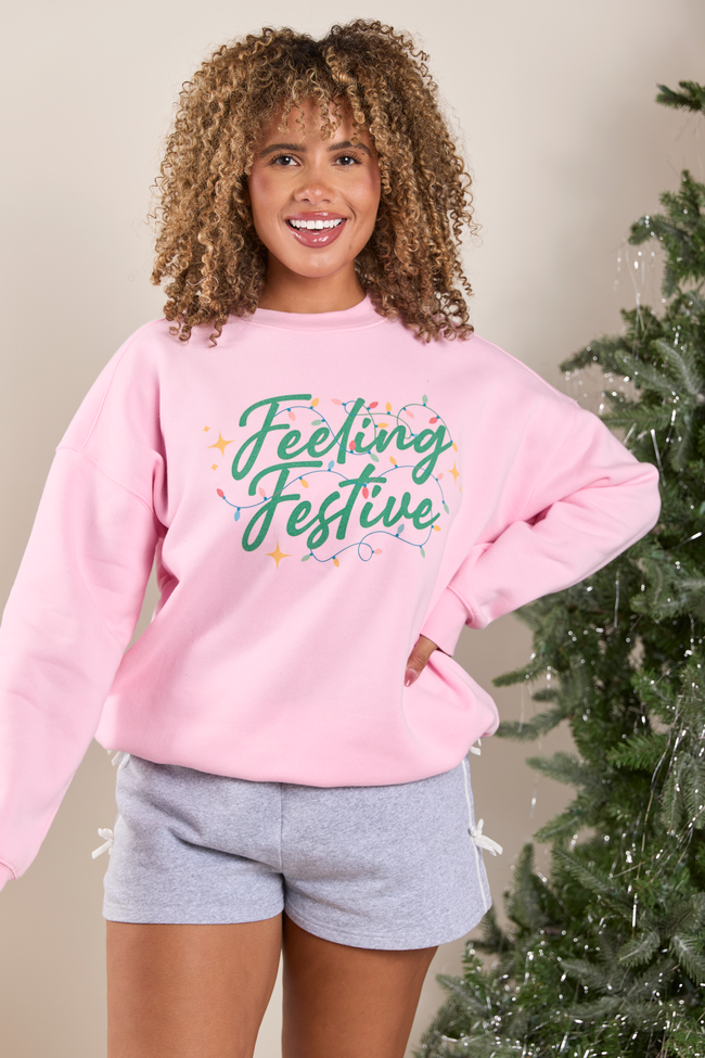 Feeling Festive Lights Light Pink Graphic Sweatshirt