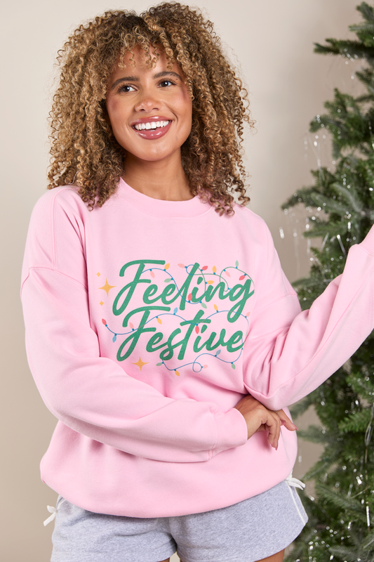 Feeling Festive Lights Light Pink Graphic Sweatshirt